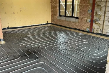 Underfloor heating being laid out in a home in Warwickshire