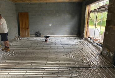 Underfloor heating being installed in a home in Rugby